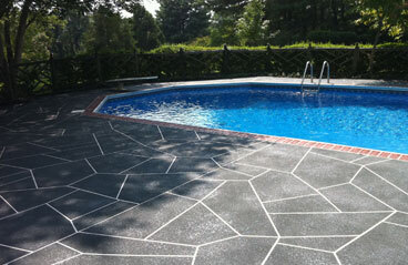 Concrete Contractors Near Me The image shows a swimming pool.
