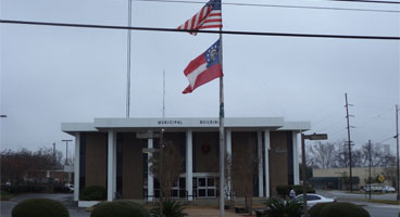 This image shows a building with an American flag.