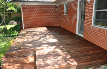 This image shows a deck wood floor that was resurfaced and looks new again.