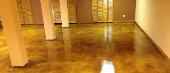 This image shows a commercial floor with epoxy that is metallic brown in color.