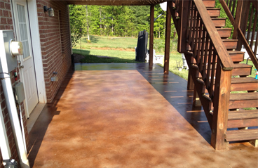 This image shows a patio floor that was resurfaced and looks new again.